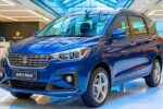 Maruti Ertiga 2026 Launched with 36 km/l Mileage Luxury Interior And Hybrid Tech